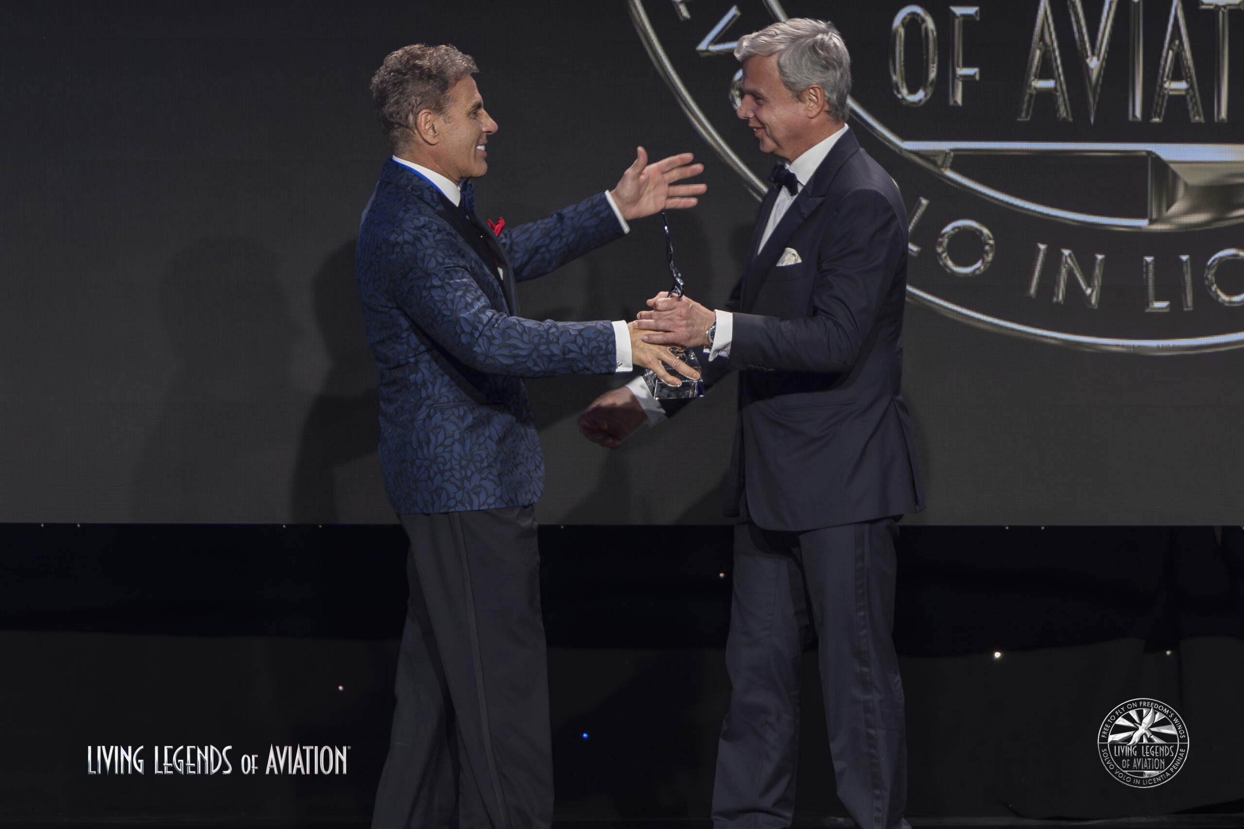 George Antoniadis accepts his Lifetime Aviation Entrepreneur Award from Kenn Ricci of Flexjet, who nominated him for the honor. / 2026 Living Legends of Aviation / Brett Johnsen.
